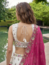 White and rani pink chiffon embroidered Lehenga