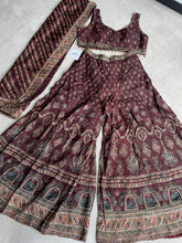 Maroon palazzos with cape