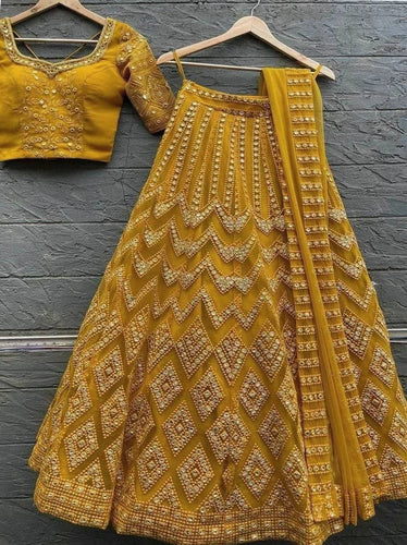 Mustard yellow embroidered silk Lehenga