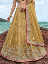 Mustard tissue embroidered lehenga