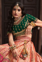 Royal collection- coral pink and bottle green banarasi silk Lehenga