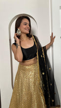 Black and gold silk Lehenga