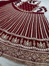 Deep red embroidery and mirror work Lehenga