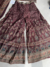 Maroon palazzos with cape