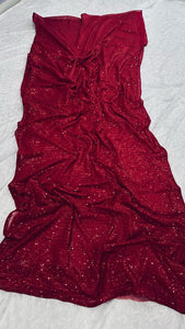 Red sequinned saree