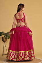 Sara - magenta leaf emblem Lehenga