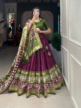 Tussar silk lehengas with patola print (skirt stitched) - wine and green