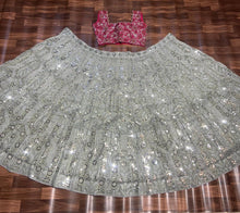 Exquisite diamond silk sage green Lehenga with contrasting colours
