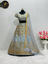 Icy blue with gold embroidered Lehenga set