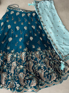 Teal blue embroidered Georgette Lehenga with the sky blue dupatta