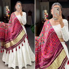 Exquisite white Lehenga with gaji silk dupatta (patola print)