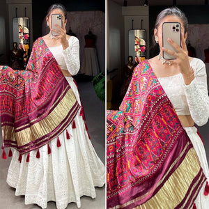 Exquisite white Lehenga with gaji silk dupatta (patola print)