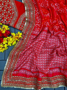 Red printed bandhani saree