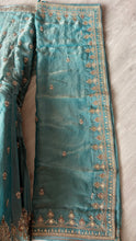 Blue and gold zari silk lehenga