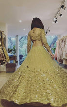 Yellow and gold embellished Lehenga