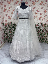 White lehenga with silver embroidery