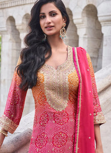 Pink and yellow bandhani print flared pants suit