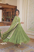 Pastel 5 layer gowns with sequinned dupatta in parrot green