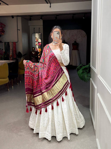 Exquisite white Lehenga with gaji silk dupatta (patola print)