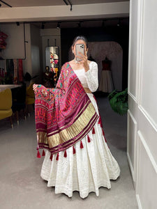 Exquisite white Lehenga with gaji silk dupatta (patola print)
