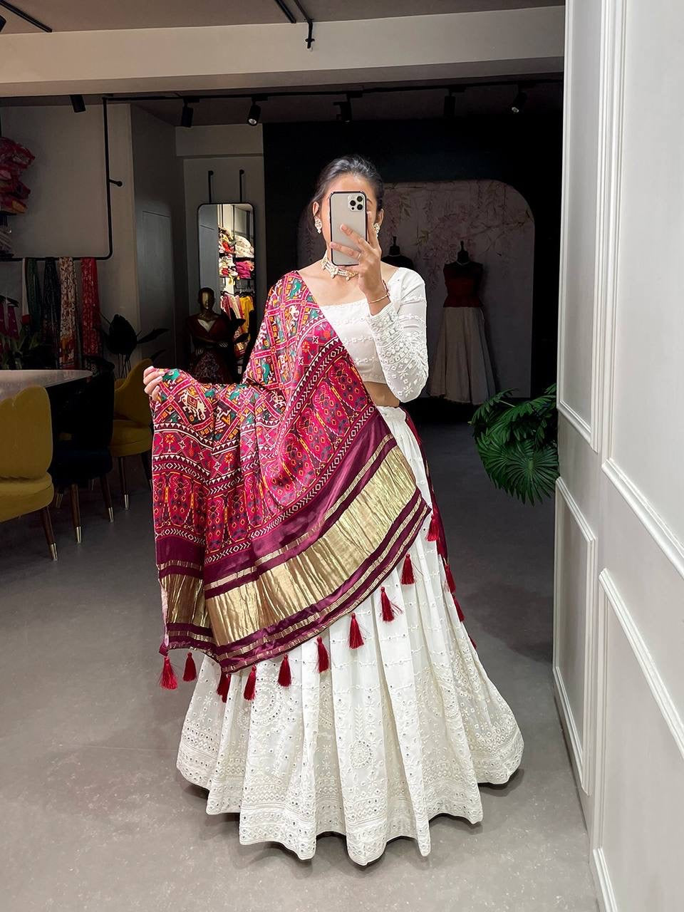 Exquisite white Lehenga with gaji silk dupatta (patola print)