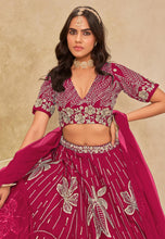 Magenta sequins leaf embroidered silk Lehenga