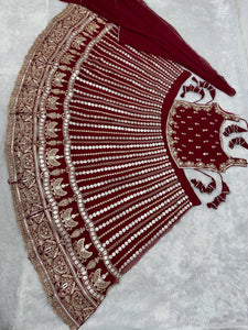 Deep red embroidery and mirror work Lehenga