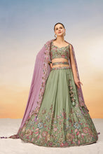 Pista Green embroidered Lehenga with peanut pink dupatta