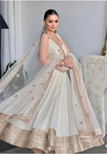 White georgette gown with gold sequins