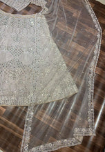 Lavender diamond net embellished Lehenga