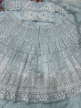 White lehenga with silver embroidery