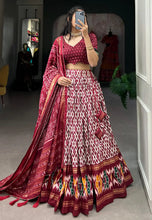Tussar silk ikkat print Lehenga in maroon (skirt stitched)