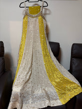 Yellow and ivory pearl beaded gown