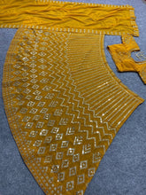 Mustard yellow embroidered silk Lehenga