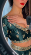 Emerald green and gold motifs lehenga
