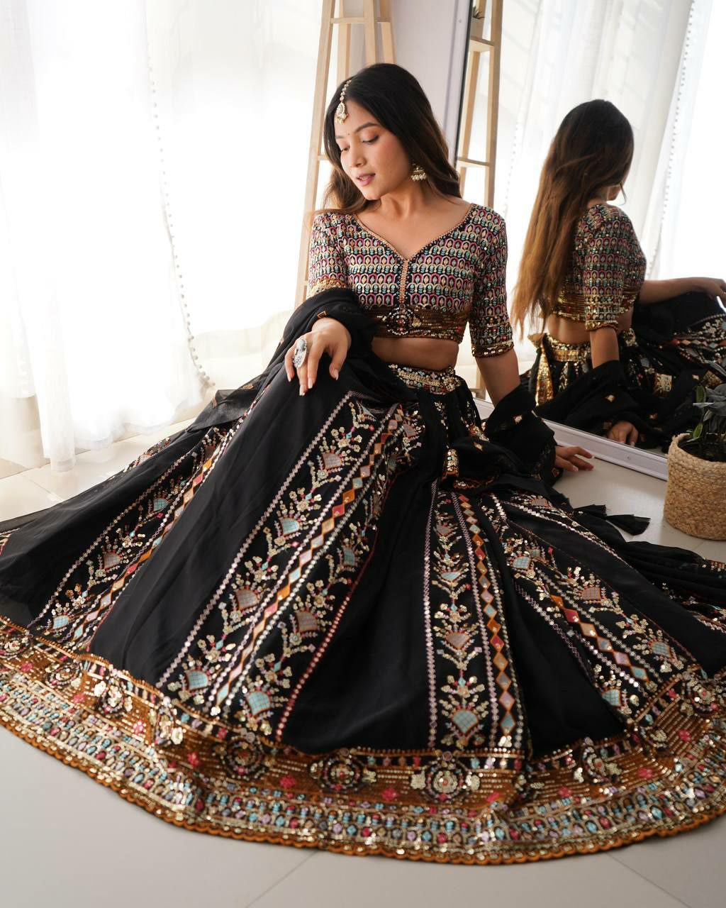 Black with pastel coloured sequins Lehenga