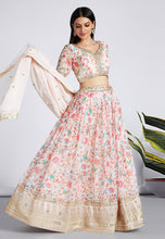 Tinge of cream and pink organza floral Lehenga