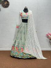 Sage green with a pop of floral colour lehenga
