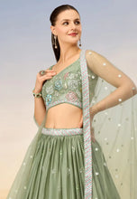 Pista Green sequins georgette Lehenga with net dupatta