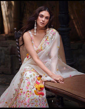 White Lehenga with multi coloured thread work