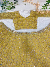 Yellow and gold embellished Lehenga