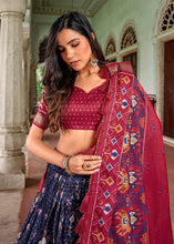 Tussar silk with patola print Lehenga in navy blue