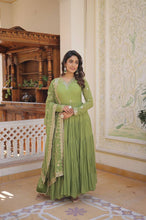 Pastel 5 layer gowns with sequinned dupatta in parrot green