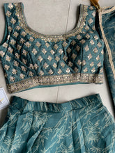 Green Organza silk readymade Lehenga (elbow length sleeves attached)