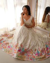 White, silver sequins and multi florals