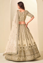Ivory and gold embroidered art silk Lehenga