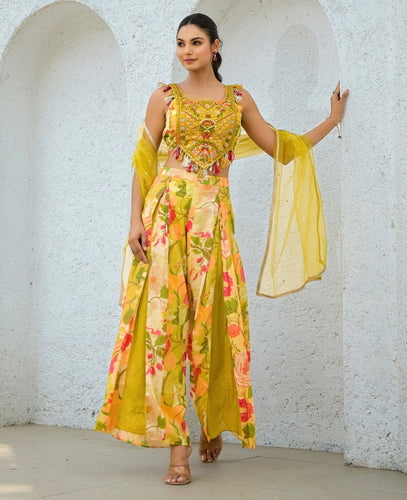 Pleated trouser style tasseled top