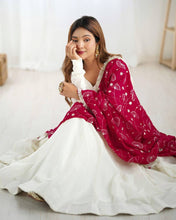 Silk off white gown with dark pink lace dupatta