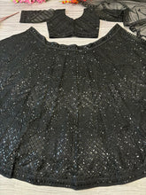 Black sequinned net embroidered Lehenga