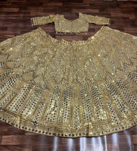Golden hour - gold embellished net Lehenga